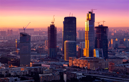 Cityscape with Skyscaper Construction at Sunrise