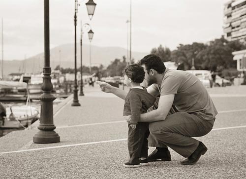 Thoughtful Father and Child Photo