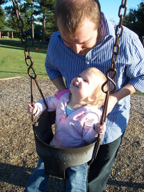 Sweetly Playful Father and Child Photo