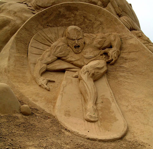 Surfing Sand Scuplture