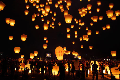 lighted lanterns in the sky