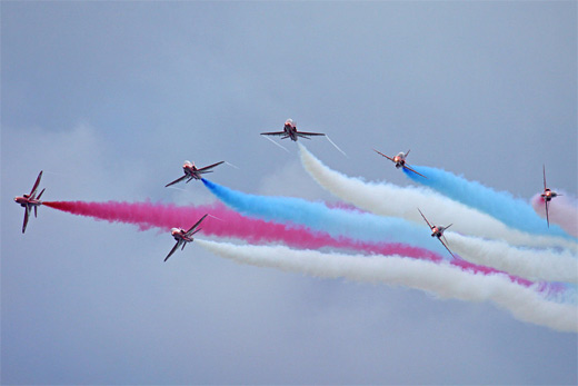 Red blue smoke aerobatic photography